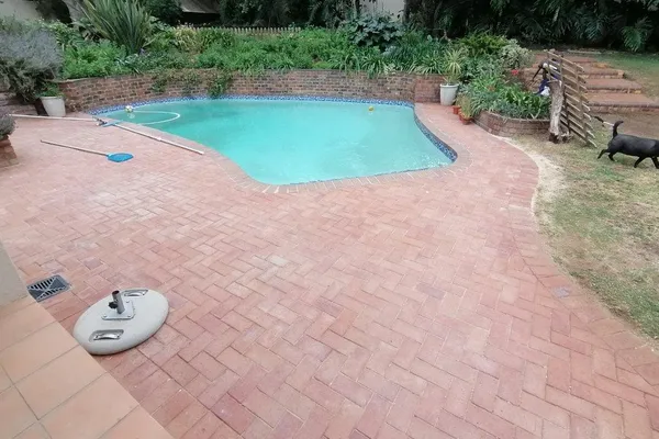 Pool Area Paving - Fourways - Pool surround paving with slip-resistant finish and attractive edging details. by Northern Paving